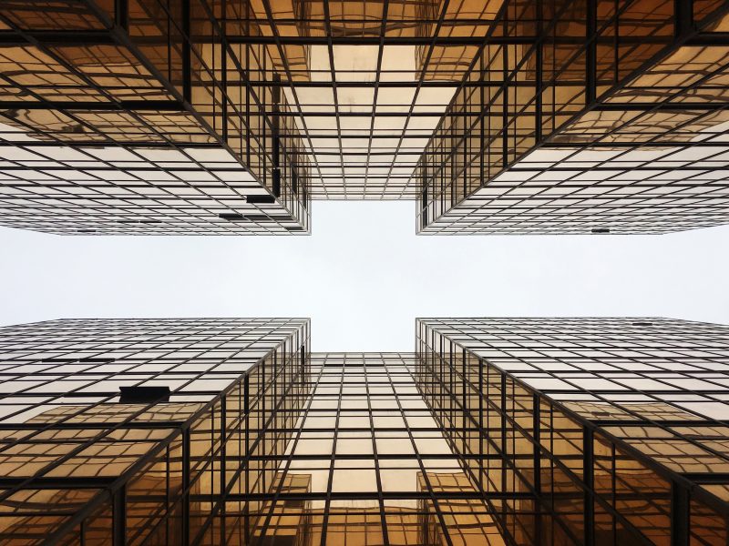 hong-kong-skyscaper-building-reflection-PV9HE9A